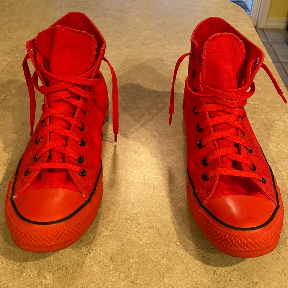 Converse men’s size 11.  I let my son design these and he put a word on the back